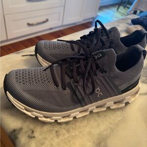 On Running Women's Athletic Shoes in blue /navy wore once . Size 9.5 women